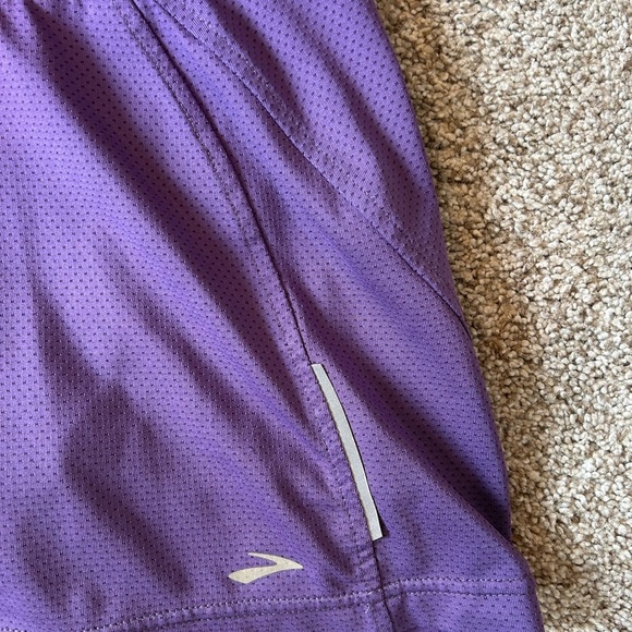 Brooks running skirt with built in shorts. Reflective areas. Back zipper pocket - Picture 2 of 10